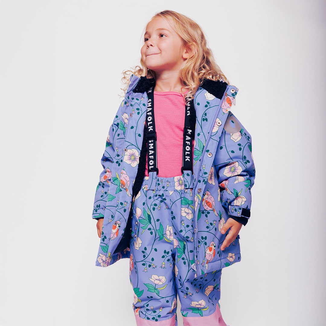 Winter coat with birds and flowers