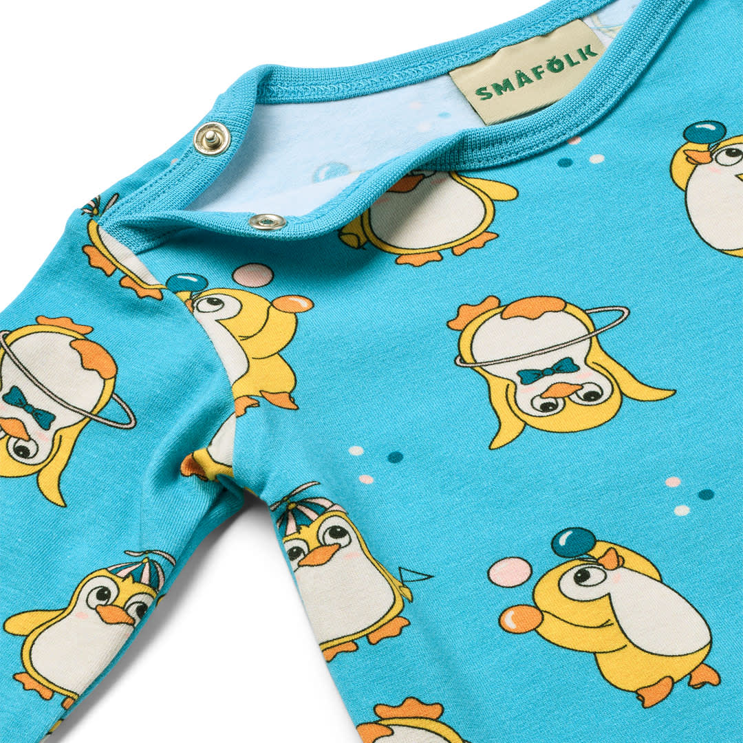 Elstar long-sleeved baby suit with circus penguins