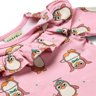 Paula Red long-sleeved baby suit with circus penguins