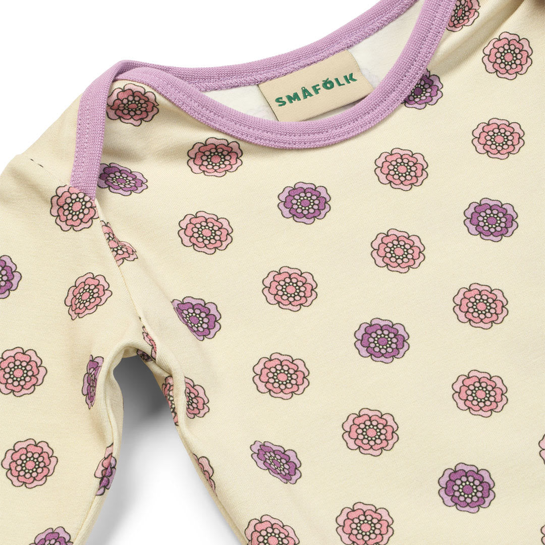 Ulm long-sleeved baby body with flowers