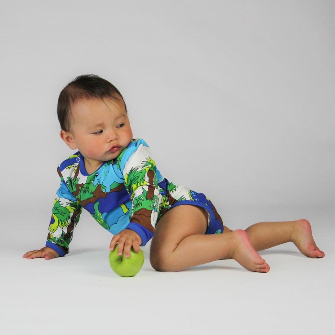 Long-sleeved baby body with dinosaurs