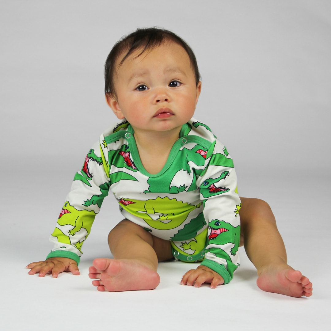 Long-sleeved baby body with crocodiles