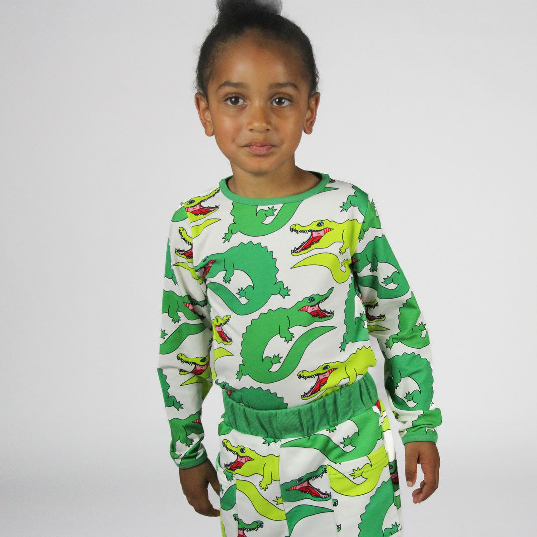 Long-sleeved top with crocodiles